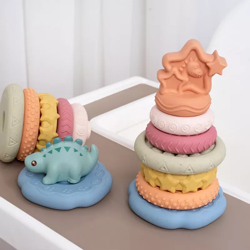 7-Piece Montessori Stacking Baby Toy Set with Dinosaur Squeeze Toy – Perfect Gift for Boys and Girls - Image 2