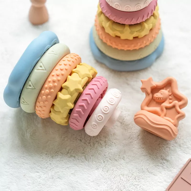 7-Piece Montessori Stacking Baby Toy Set with Dinosaur Squeeze Toy – Perfect Gift for Boys and Girls - Image 3