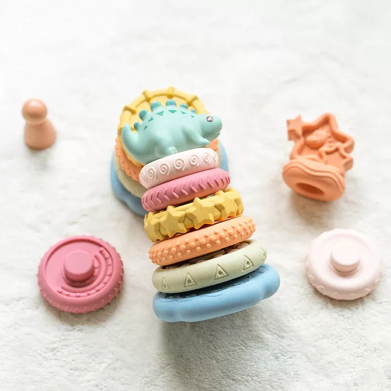 7-Piece Montessori Stacking Baby Toy Set with Dinosaur Squeeze Toy – Perfect Gift for Boys and Girls - Image 4